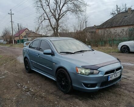 Серый Мицубиси Лансер, объемом двигателя 2 л и пробегом 237 тыс. км за 4800 $, фото 1 на Automoto.ua