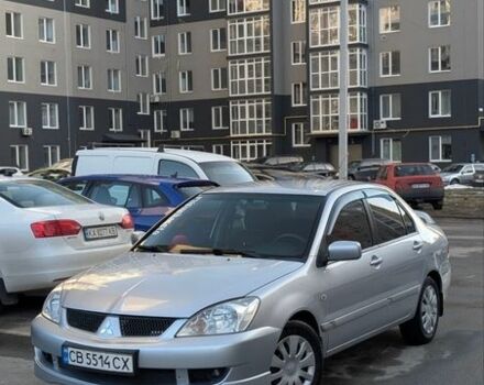 Серый Мицубиси Лансер, объемом двигателя 1.6 л и пробегом 260 тыс. км за 4000 $, фото 1 на Automoto.ua