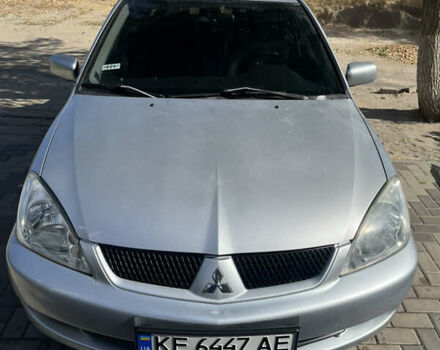 Сірий Міцубісі Lancer, об'ємом двигуна 1.58 л та пробігом 212 тис. км за 5600 $, фото 1 на Automoto.ua