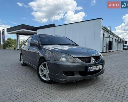 Сірий Міцубісі Lancer, об'ємом двигуна 2 л та пробігом 302 тис. км за 4000 $, фото 1 на Automoto.ua