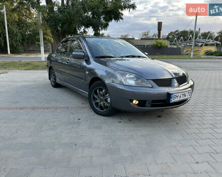 Сірий Міцубісі Lancer, об'ємом двигуна 1.6 л та пробігом 189 тис. км за 6200 $, фото 1 на Automoto.ua