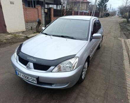 Сірий Міцубісі Lancer, об'ємом двигуна 1.8 л та пробігом 107 тис. км за 4300 $, фото 1 на Automoto.ua