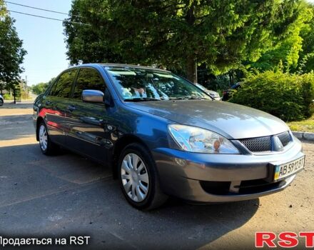 Сірий Міцубісі Lancer, об'ємом двигуна 1.6 л та пробігом 190 тис. км за 4200 $, фото 1 на Automoto.ua