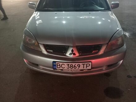 Серый Мицубиси Лансер, объемом двигателя 1.6 л и пробегом 308 тыс. км за 3800 $, фото 1 на Automoto.ua