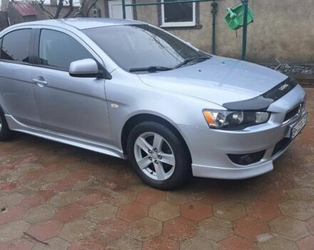 Серый Мицубиси Лансер, объемом двигателя 2 л и пробегом 230 тыс. км за 5999 $, фото 1 на Automoto.ua
