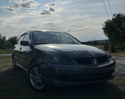 Сірий Міцубісі Lancer, об'ємом двигуна 2 л та пробігом 178 тис. км за 3650 $, фото 1 на Automoto.ua