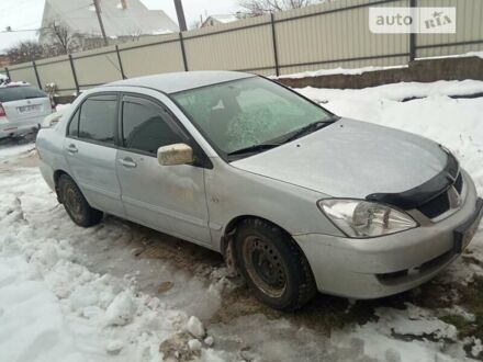 Сірий Міцубісі Lancer, об'ємом двигуна 0 л та пробігом 206 тис. км за 4000 $, фото 1 на Automoto.ua