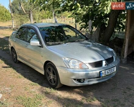 Сірий Міцубісі Lancer, об'ємом двигуна 1.58 л та пробігом 260 тис. км за 4000 $, фото 1 на Automoto.ua