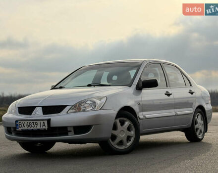 Серый Мицубиси Лансер, объемом двигателя 1.3 л и пробегом 160 тыс. км за 5555 $, фото 1 на Automoto.ua