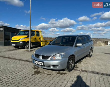 Серый Мицубиси Лансер, объемом двигателя 1.6 л и пробегом 505 тыс. км за 1999 $, фото 1 на Automoto.ua