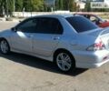 Сірий Міцубісі Lancer, об'ємом двигуна 2 л та пробігом 130 тис. км за 6900 $, фото 1 на Automoto.ua