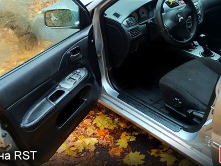 Серый Мицубиси Лансер, объемом двигателя 1.6 л и пробегом 430 тыс. км за 2500 $, фото 1 на Automoto.ua