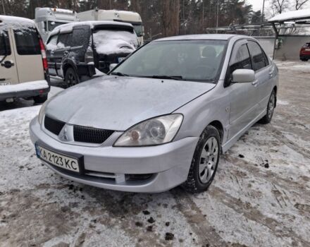 Сірий Міцубісі Lancer, об'ємом двигуна 1.6 л та пробігом 245 тис. км за 3999 $, фото 1 на Automoto.ua