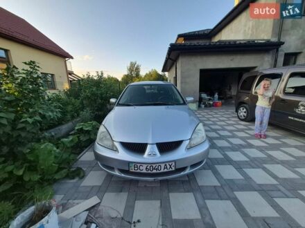 Серый Мицубиси Лансер, объемом двигателя 1.6 л и пробегом 388 тыс. км за 2950 $, фото 1 на Automoto.ua