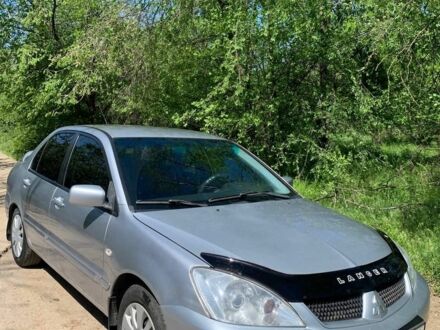 Сірий Міцубісі Lancer, об'ємом двигуна 1.6 л та пробігом 323 тис. км за 4499 $, фото 1 на Automoto.ua