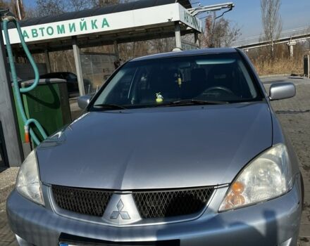 Сірий Міцубісі Lancer, об'ємом двигуна 1.6 л та пробігом 311 тис. км за 3800 $, фото 1 на Automoto.ua