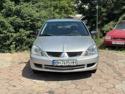 Сірий Міцубісі Lancer, об'ємом двигуна 1.3 л та пробігом 250 тис. км за 4350 $, фото 1 на Automoto.ua