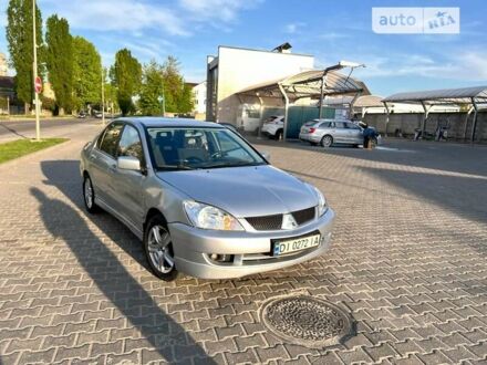 Сірий Міцубісі Lancer, об'ємом двигуна 1.6 л та пробігом 230 тис. км за 4000 $, фото 1 на Automoto.ua