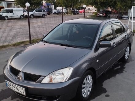 Сірий Міцубісі Lancer, об'ємом двигуна 1.6 л та пробігом 178 тис. км за 5464 $, фото 1 на Automoto.ua