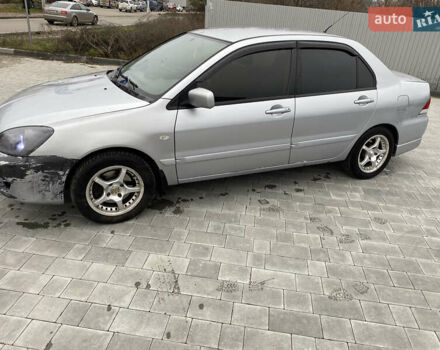 Сірий Міцубісі Lancer, об'ємом двигуна 1.6 л та пробігом 263 тис. км за 2350 $, фото 1 на Automoto.ua