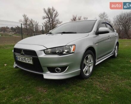 Сірий Міцубісі Lancer, об'ємом двигуна 2 л та пробігом 124 тис. км за 7499 $, фото 1 на Automoto.ua