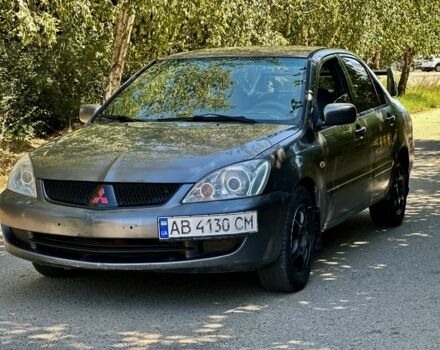 Сірий Міцубісі Lancer, об'ємом двигуна 1.6 л та пробігом 288 тис. км за 2500 $, фото 1 на Automoto.ua
