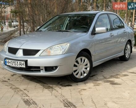 Серый Мицубиси Лансер, объемом двигателя 1.58 л и пробегом 183 тыс. км за 4200 $, фото 1 на Automoto.ua
