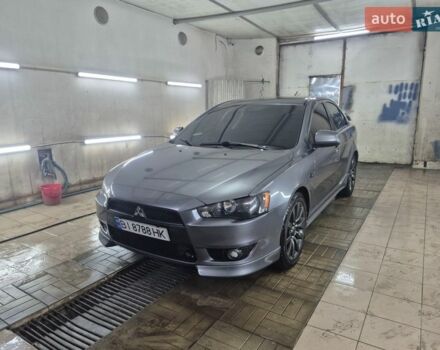 Серый Мицубиси Лансер, объемом двигателя 2 л и пробегом 245 тыс. км за 7700 $, фото 1 на Automoto.ua