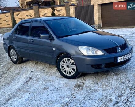 Серый Мицубиси Лансер, объемом двигателя 1.6 л и пробегом 239 тыс. км за 4500 $, фото 1 на Automoto.ua