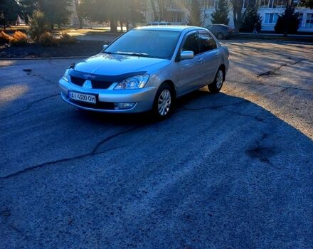 Серый Мицубиси Лансер, объемом двигателя 1.8 л и пробегом 106 тыс. км за 4500 $, фото 1 на Automoto.ua