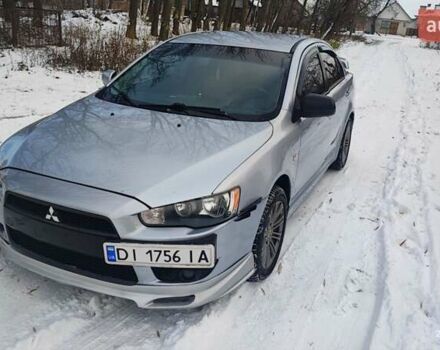 Серый Мицубиси Лансер, объемом двигателя 1.5 л и пробегом 292 тыс. км за 5000 $, фото 1 на Automoto.ua