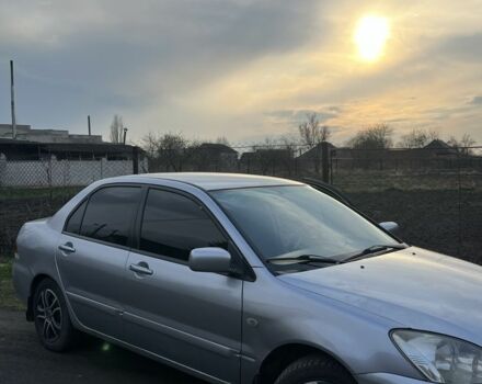 Сірий Міцубісі Lancer, об'ємом двигуна 1.6 л та пробігом 248 тис. км за 3000 $, фото 1 на Automoto.ua