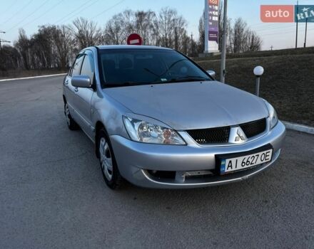 Сірий Міцубісі Lancer, об'ємом двигуна 1.58 л та пробігом 217 тис. км за 3300 $, фото 1 на Automoto.ua