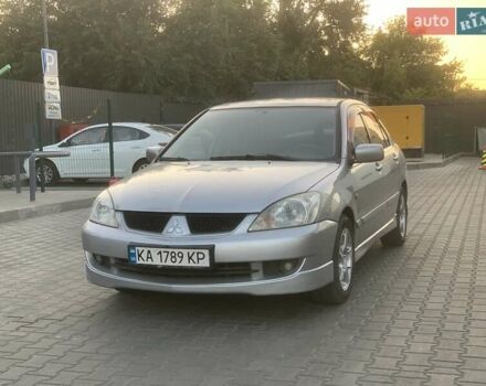 Сірий Міцубісі Lancer, об'ємом двигуна 1.58 л та пробігом 316 тис. км за 3450 $, фото 1 на Automoto.ua