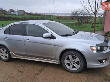 Серый Мицубиси Лансер, объемом двигателя 2 л и пробегом 226 тыс. км за 5999 $, фото 1 на Automoto.ua