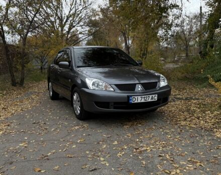Сірий Міцубісі Lancer, об'ємом двигуна 1.6 л та пробігом 247 тис. км за 4900 $, фото 1 на Automoto.ua