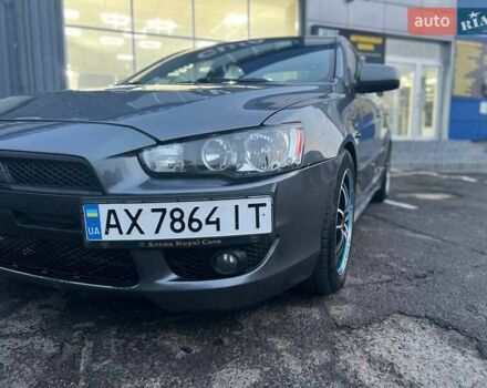 Серый Мицубиси Лансер, объемом двигателя 2 л и пробегом 170 тыс. км за 6999 $, фото 1 на Automoto.ua