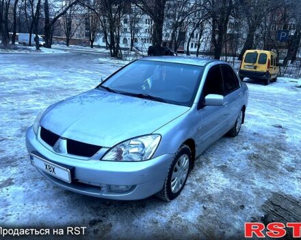 Серый Мицубиси Лансер, объемом двигателя 1.6 л и пробегом 23100 тыс. км за 3600 $, фото 1 на Automoto.ua