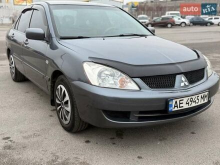Сірий Міцубісі Lancer, об'ємом двигуна 1.6 л та пробігом 270 тис. км за 4300 $, фото 1 на Automoto.ua