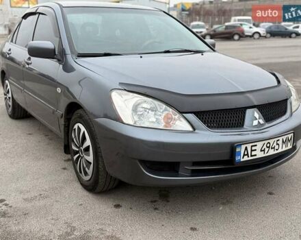 Сірий Міцубісі Lancer, об'ємом двигуна 1.6 л та пробігом 270 тис. км за 4300 $, фото 1 на Automoto.ua