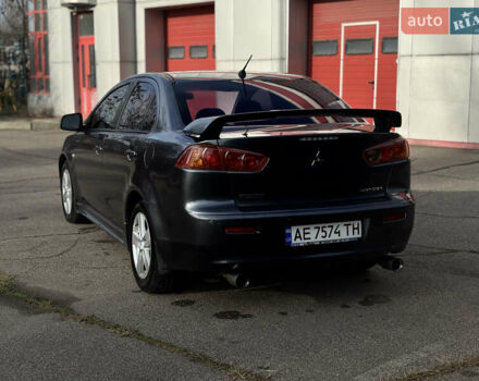 Серый Мицубиси Лансер, объемом двигателя 2 л и пробегом 220 тыс. км за 6800 $, фото 1 на Automoto.ua