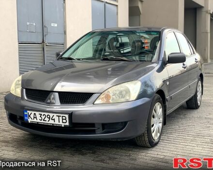 Серый Мицубиси Лансер, объемом двигателя 1.6 л и пробегом 225 тыс. км за 4200 $, фото 1 на Automoto.ua