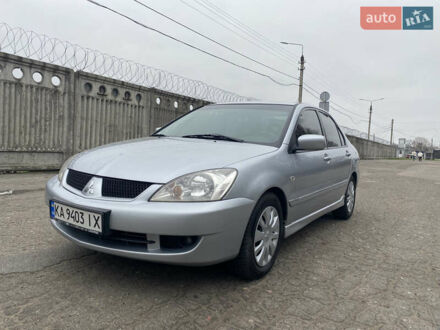 Сірий Міцубісі Lancer, об'ємом двигуна 1.58 л та пробігом 240 тис. км за 5500 $, фото 1 на Automoto.ua