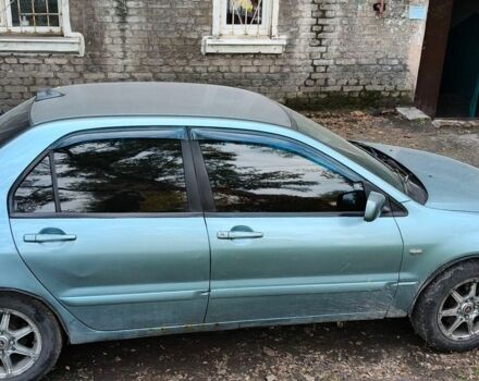 Сірий Міцубісі Lancer, об'ємом двигуна 1.6 л та пробігом 300 тис. км за 3700 $, фото 1 на Automoto.ua