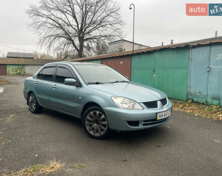 Серый Мицубиси Лансер, объемом двигателя 1.58 л и пробегом 205 тыс. км за 4750 $, фото 1 на Automoto.ua