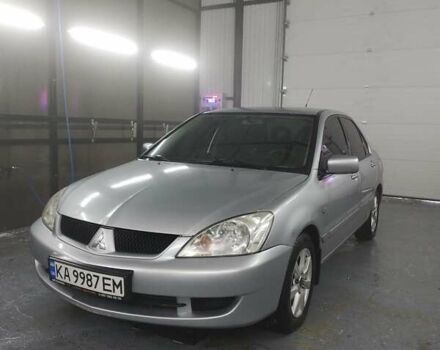 Сірий Міцубісі Lancer, об'ємом двигуна 1.6 л та пробігом 330 тис. км за 3900 $, фото 1 на Automoto.ua