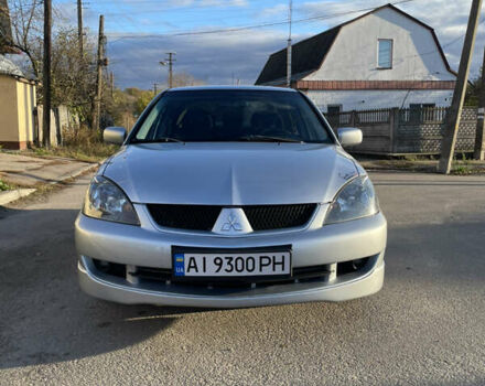 Сірий Міцубісі Lancer, об'ємом двигуна 2 л та пробігом 177 тис. км за 5399 $, фото 1 на Automoto.ua