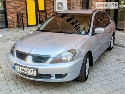 Сірий Міцубісі Lancer, об'ємом двигуна 1.58 л та пробігом 190 тис. км за 3995 $, фото 1 на Automoto.ua