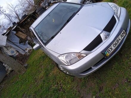 Сірий Міцубісі Lancer, об'ємом двигуна 1 л та пробігом 400 тис. км за 2850 $, фото 1 на Automoto.ua