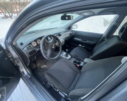 Серый Мицубиси Лансер, объемом двигателя 1.6 л и пробегом 270 тыс. км за 4900 $, фото 1 на Automoto.ua